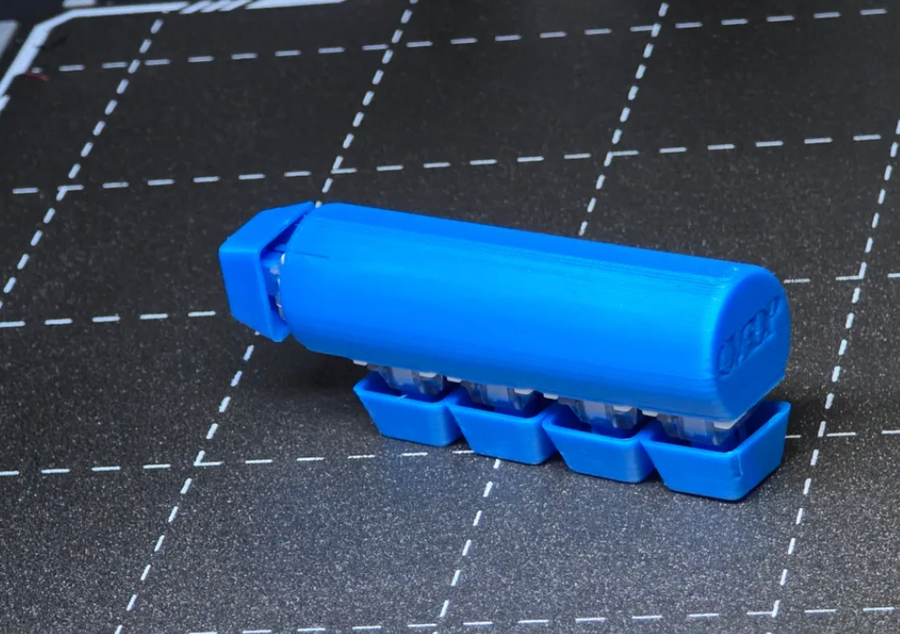 3D-printed keyboard switch fidget toy with four clicky mechanical switches