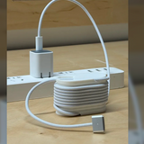 3D-printed cable management winder with coiled cable