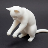 Peeking Cat Monitor Buddy, 3D-printed white cat figurine, studio view