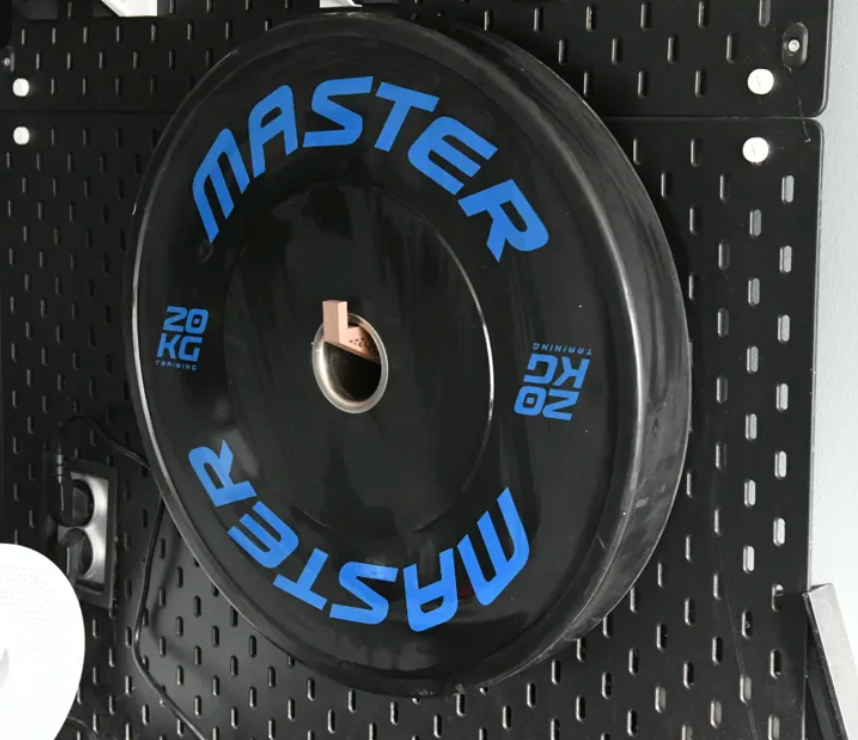 3D-printed weight-plate-shaped pegboard holder